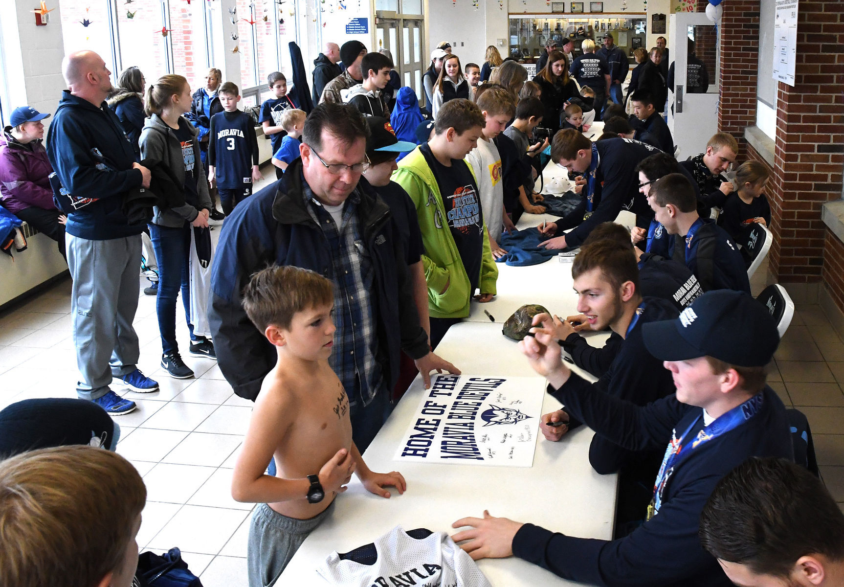 Moravia basketball celebration
